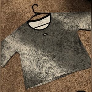 This is a brand new, never worn, Addidas size small crop top